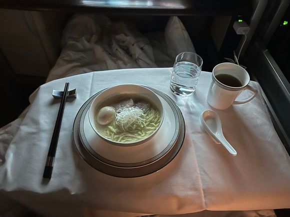Chicken ramen snack mid flight. 
