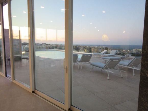 Looking out from GinGer rooftop bar to the pool area