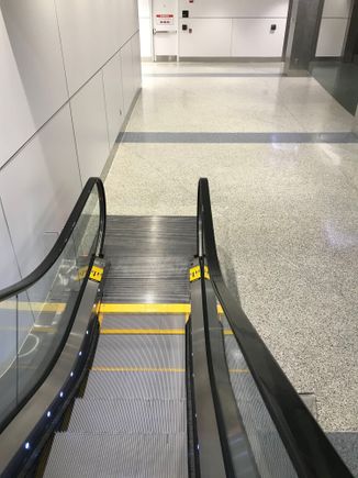 Down escalator