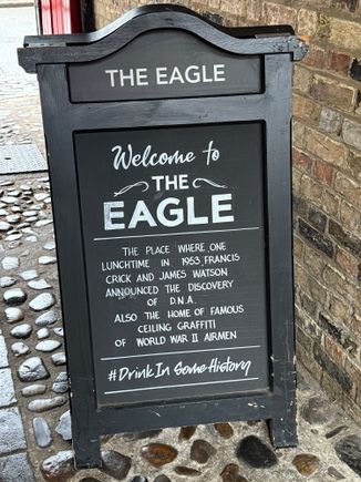 The Eagle Pub in Cambridge. It was a popular gathering place for first RAF and later USAAF Airmen. Many burned their names into the ceiling, and some even drew pictures. It was also a popular gathering place for Watson & Crick. 