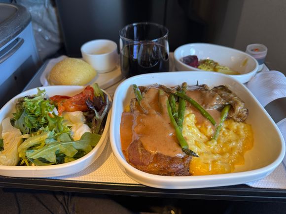 Starter: Herb ricotta cheese with baby beets, toasted pistachios and pineapple citrus vinaigrette

Salad: Baby red oak leaf arugula salad with shave parmesan, artichokes and roasted red tomatoes

Entree: Braised osso buco with savory braising jus, golden milanese risotto and char-grilled asparagus spears