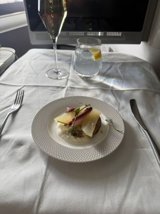 Pear and goat cheese (very mild) amuse bouche. Still missing the canapés 