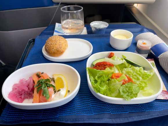 Smoked salmon tenderloin (or "raw salmon" according to crew) starter served with the tiny aluminum ramekin of nuts.