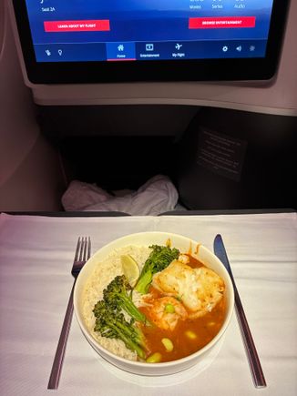 Chilean sea bass option; supposed to be with the dill beurre blanc sauce but came with a curry sauce instead. Fish was good and came with a bonus shrimp! 