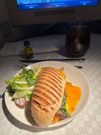 Roasted beef and turkey panini with salad.  Rather mediocre but a significant improvement on the truly awful cheeseburger they used to serve !