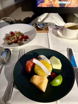 second meal before landing-  fruit plate and cereal 