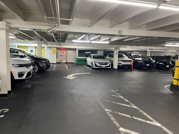 They have more cars parked upstairs (except upstairs the cars are mixed with other people's cars so a picture would not be accurate)