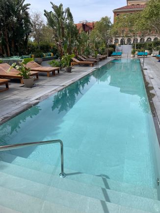Pool deck, loungers chairs and a large seating area not pictured. 