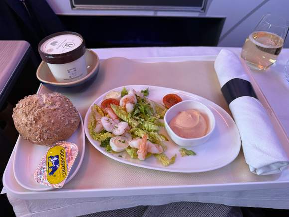 Meal before arrival: poached scampi