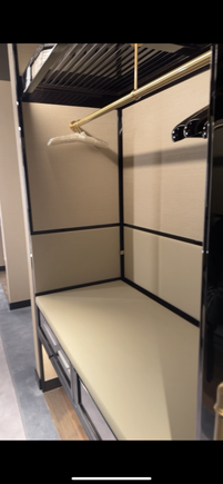 Place for your luggage and coats. There are 2 of these right across from each other