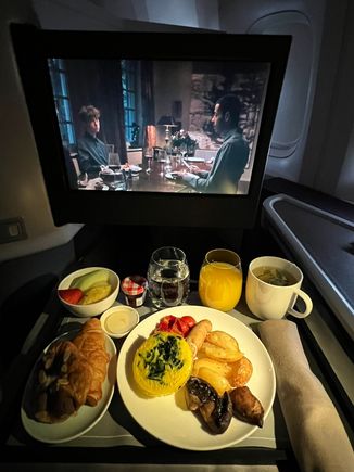 Breakfast all on one tray with small fruit bowl only. Doesn't look like an appetizing first meal to be served on a 15-hour flight. 