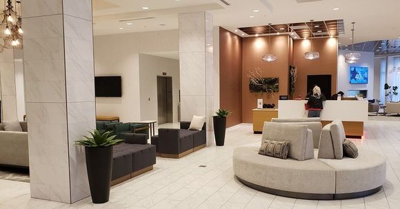 Check-in desk with front door to the right
