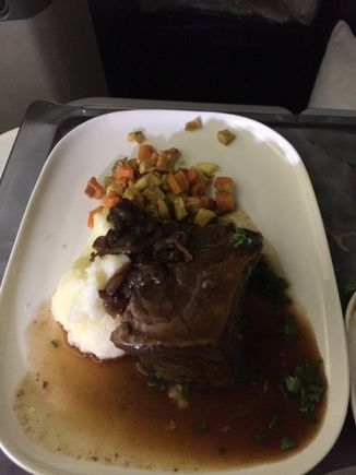 Main course (pre-ordered) - Braised short rib with potato puree, roasted root vegetables and balsamic onions. The ambien was really kicking in here so sorry for poor composition. :)