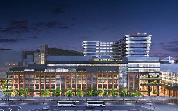 Artist rendering of completed hotel (L-shaped building in background)