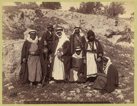 Bedouins pretending it's hot in the desert. But you can tell their faking it because look at all those clothes they're wearing!