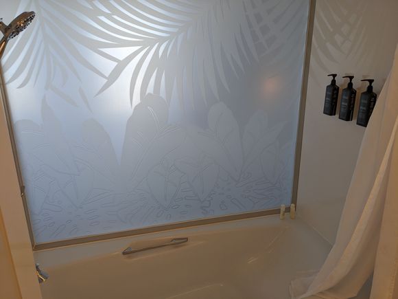 Very nice opaque glass between the bathroom and the bed area. However, when the lights in the bathroom are on, the bed area is illuminated too at night.