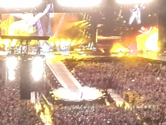 I still have the world's worst cellphone for concert photography. That individual near the end of the catwalk is Mick. I don't so much mind the terrible phone because it discourages trying to experience the show through it.
