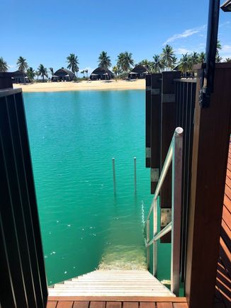 Stairs into the water from over water room
