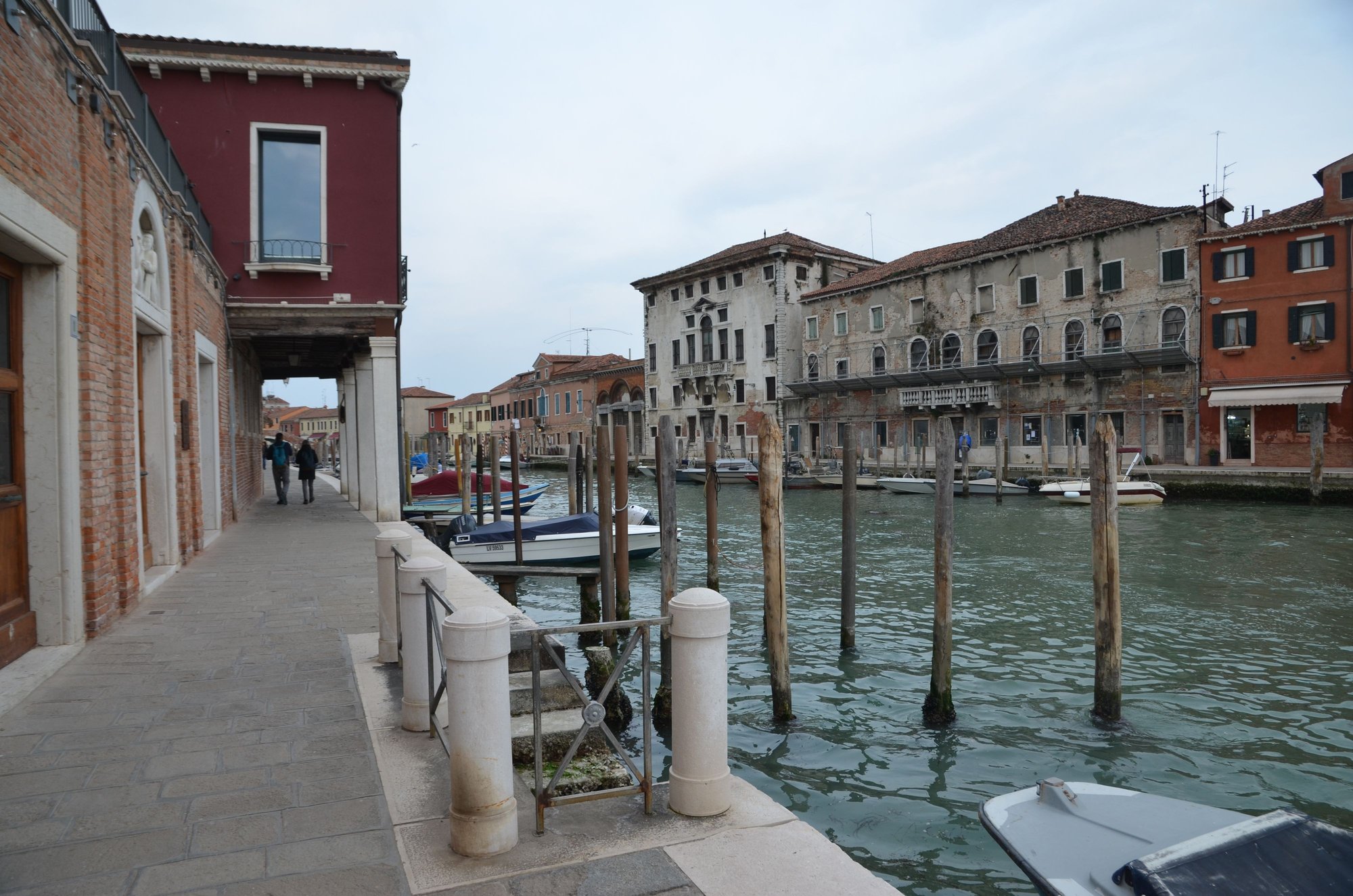 Walking along a Murano canal