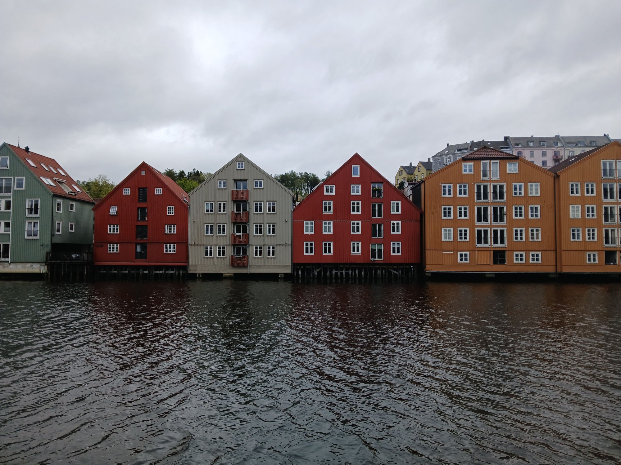 Frontal view of warehouses, many converted to homes, shops or cafes