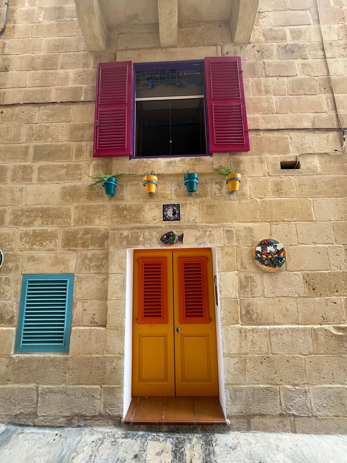 Walking along the streets and seeing some welcoming doorways in Senglea
