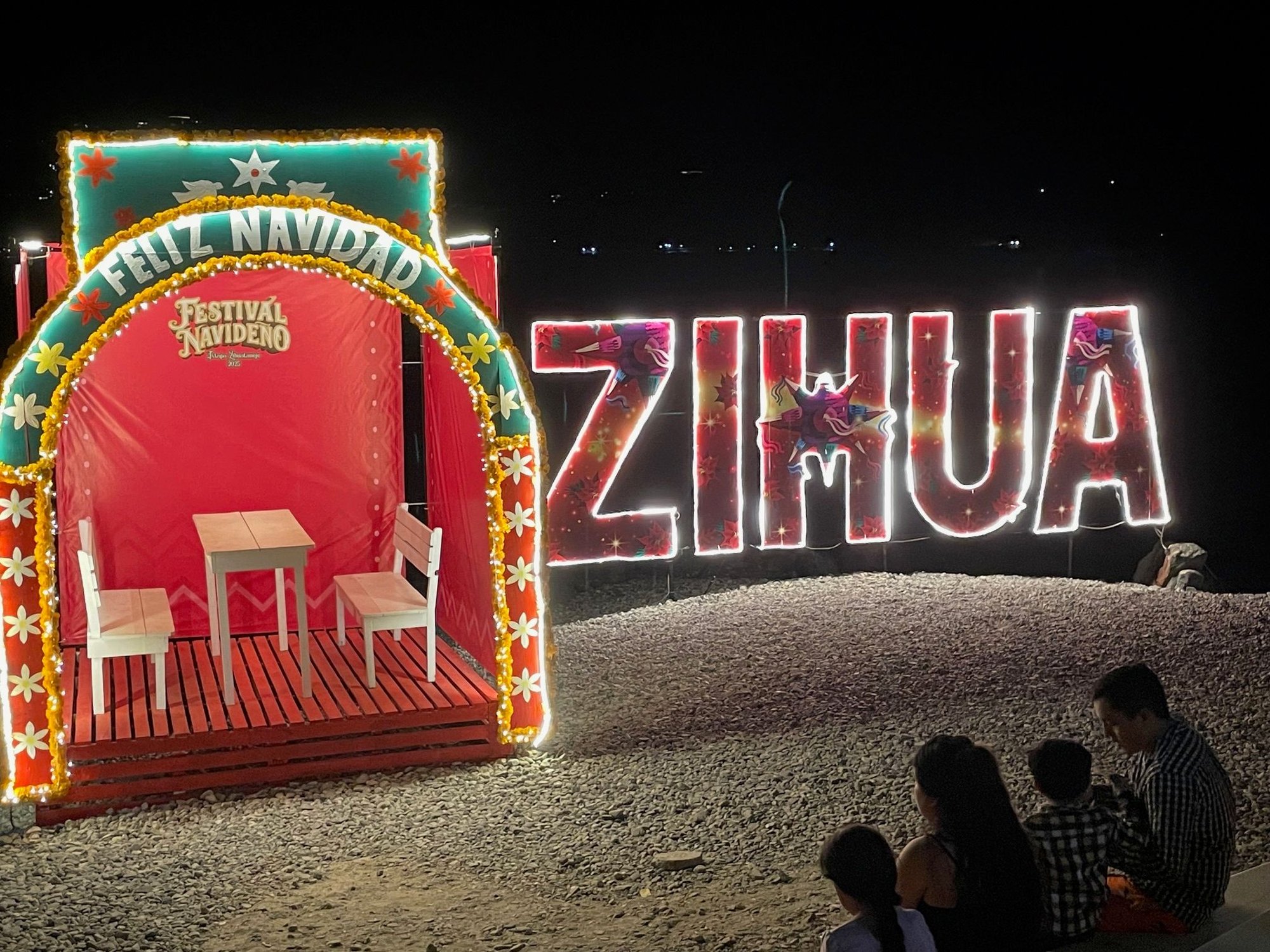 I showed this picture yesterday, but now here it is in all it's lit-up glory.  This is right on the beach.  Not sure of the significance of the table and chairs.  I guess Jesus or Santa can sit down and have a quick bite on a busy Christmas Eve.