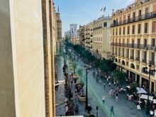 View from the balcony of our apartment. Thankfully, the windows block out a lot of the noise. Fun to people watch!