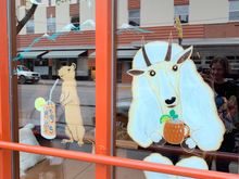 A rock chuck and mountain goat enjoying a cocktail at Montgomery Distillery. 