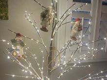 Hung my kids on this tree. Ha!! These are 3 porcelain angels my sister gave me years ago because they resembled my own kids.  