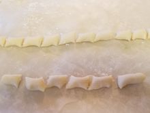 Cutting the dough strips into  nice pieces !