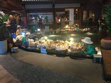 Sook Siam...an area representative of all parts of Thailand.   Examples of buildings and food.  Mini floating market