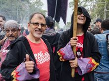 We had a nice chat with this pair. The mentally-challenged son bearing the trident on the right was this year's kids Correfoc parade leader. I explained to his dad on the left how I'd once been a Spec Ed teacher and after that we hit it off.