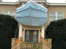 My daughter’s neighborhood usually goes all out for Halloween.  This is one of the houses on her street this year.