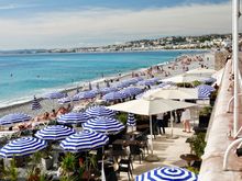 Nice’s beaches are rocks, no sand, but didn’t matter to the sun bathers.