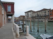 Walking along a Murano canal