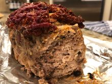 It looks like my regular meatloaf but the texture is actually very smooth.  We’ll see how it sets up overnight  in the fridge. The tomatoes and paste have cooked down into a delicious thick jammy topping.  