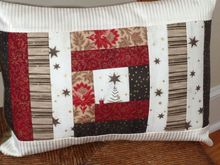 I used to make large quilts when I was in my 20s/30s, but a few years ago I had some time on my hands between jobs and I made a lot of quilted pillows - much more immediate gratification. I wish I had taken photos of them - seems I made them for a lot of people. This is a Christmas one for a young man we know who loves everything related to Christmas. 