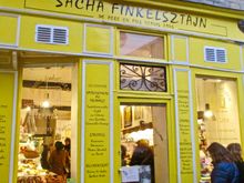 Florence Finkel-way-too-many-Polish-consonants-stein in the rue des Rosiers. We're coming back here to load up on bagels and bialys before we head home.