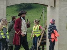 One organizer became rightly FURIOUS after careless parents allowed their children to frolic in the fields below. Nearly 100 excited kids collected there. Thing is, there were fireworks planted there. He went ballistic and who could blame him? The announcer above rightly asked the crowd watching the shin-kicking from the hill then, "Folks up there: whose little girl keeps screaming 'BLOOD!!' ? He wasn't kidding. The girl was quite animated and everyone in the large crowd heard her every shriek!