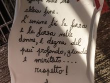 We always try to display fotos of the unusual. Here is a stylized letter, probably written by a local young man. My Italian is weak, and hopefully someone here will clarify, but is he not extolling the virtues of a certain shapely young woman? This letter was tied with an elaborate ribbon to the rainbow bench at Procida's main ferry terminal. Respetto da....