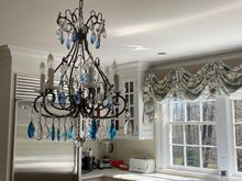 This really was perfect in our CT kitchen - it was bought in a local shop for our Switzerland dining area.  Another nice antique one is in our bedroom. 