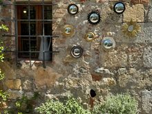 I love the contrast of old stone with greenery . . .