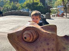 He got to climb on a lizard yesterday.