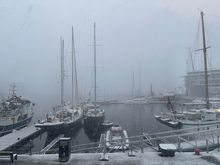 All gray and heavy clouds rowed in