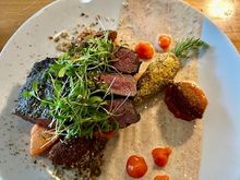 African flavored lamb with red lentil croquettes, apricot marmalade, carrots and a yogurt spiced sauce.