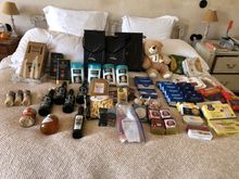 Overview of 2023 still life entitled "How am I going to stuff this all in the suitcase?