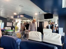 Interior of hydrofoil to Salina.  Very HOT.  Note to bring a fan next time; many people were fanning themselves with real fans or whatever they could get their hands on, including their cell phones!