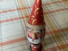 Ths is my favorite. Wooden egg has a paper mache cone hat and sits on a small, short turning.mit is embellished with Quikwood to make nose,mhat band, etc. i still need to paint hat band white.