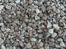 Surface of Rinella beach closer to the sea, the pebbles get much smaller and the slope to the water is very steep.   Water shoes are a MUST!!