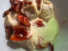 One of the standout dishes of the trip so far:  Partner's fresh tortilla stuffed with a stracotto (stew) of black piglet (likely from the Nebrodi Mountains, where 
Sicily's most lauded pigs are bred.  Bathed in a Pecorino-based sauce and topped with divine cherry tomatoes and crispy and delicious slices of guanciale (pig jowl, most commonly used as an ingredient in pasta all carbonara, quintessential dish off Rome and all of Lazio)